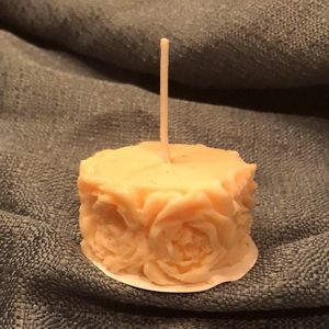 Hand Crafted rose tealight candles. 2 tealight candles for 8 dollars